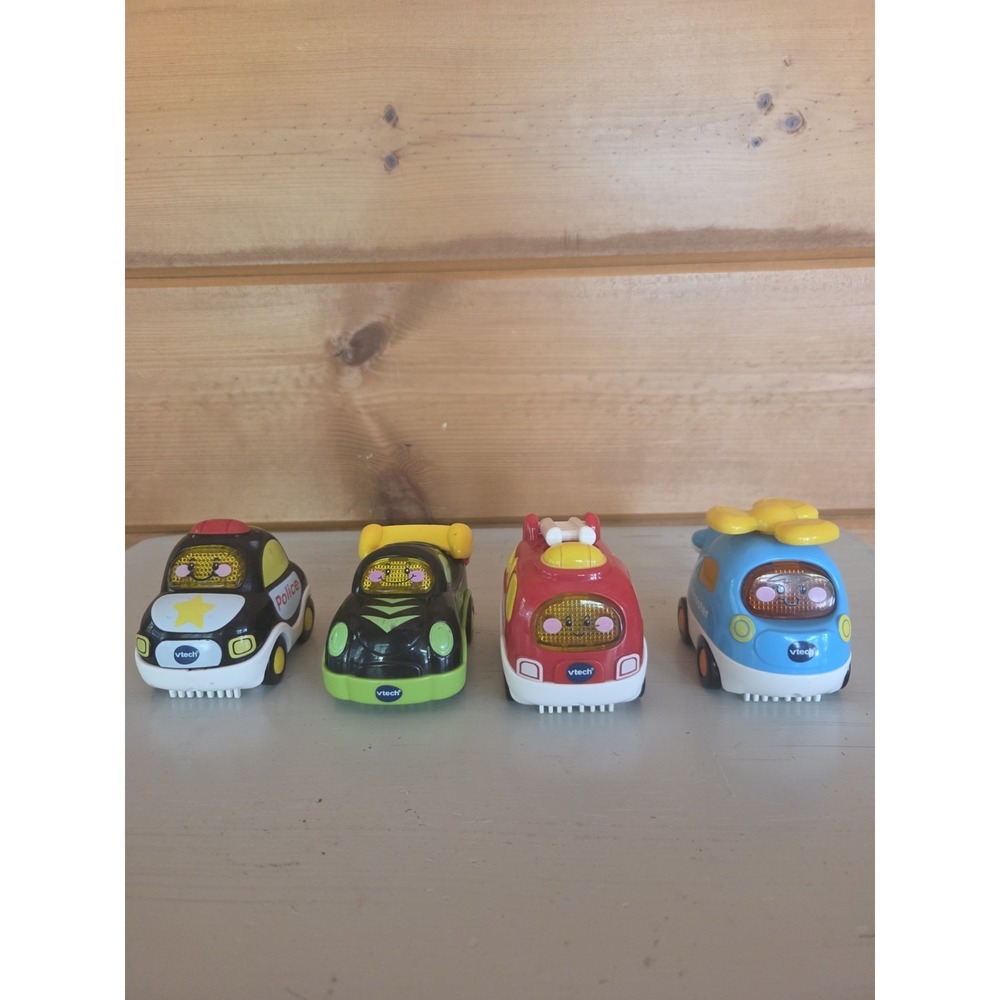 Lot of 4 VTech Go! Go! Smart Wheels Police Car Fire Truck Racecar Helicopter ZB4